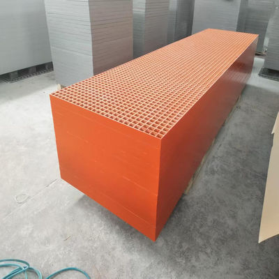 Orange color grating of mesh size 40x40 of height 50mm, panel size 1007x4040mm, concave surface. Perfect for water plant walkway or corridor